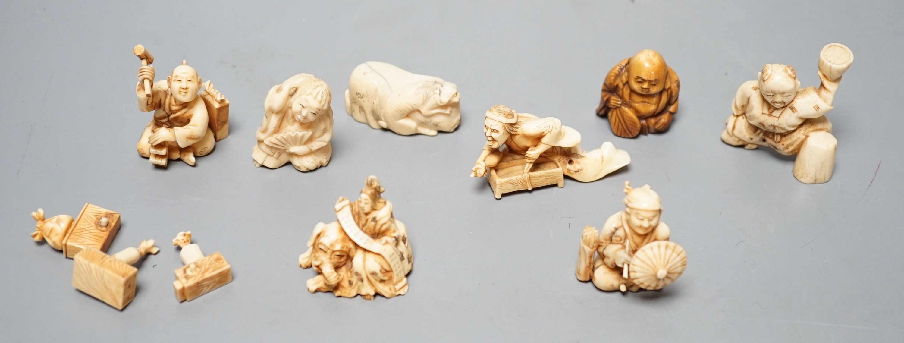 A collection of eight Japanese Ivory and bone Netsuke and okimono, 19th/early 20th century